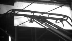 Side view original image of a pantograph with notch damage